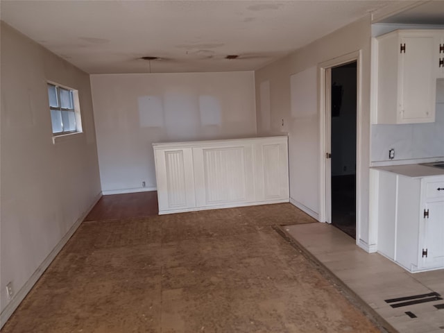 interior space featuring white cabinetry