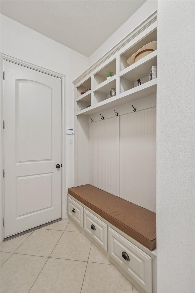 mudroom with light tile patterned floors