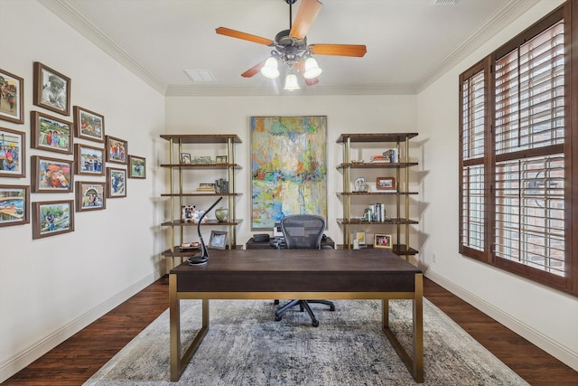 office space with ornamental molding, plenty of natural light, and dark wood-type flooring