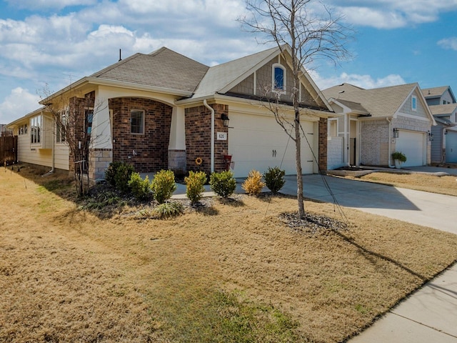 view of front of home with driveway, an attached garage, roof with shingles, and brick siding