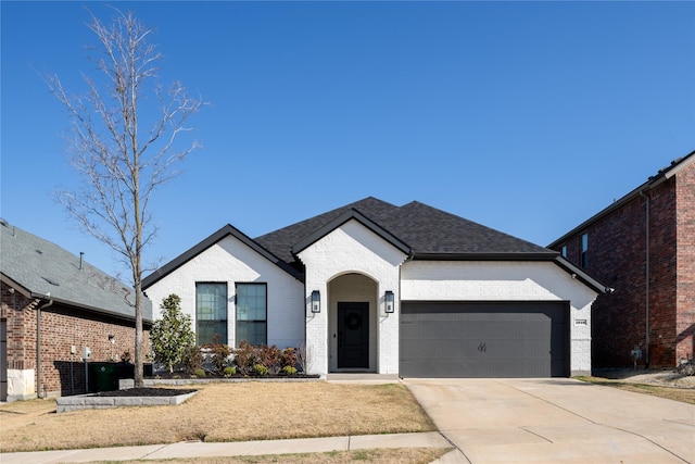 view of front of house with a garage