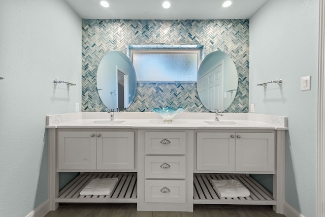 4800 Lusk Ln, Flower Mound, TX 75028 - bathroom featuring double vanity, baseboards, tile walls, and recessed lighting