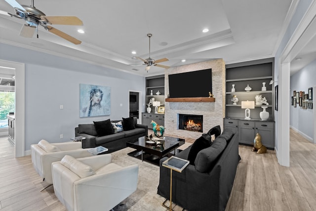 4800 Lusk Ln, Flower Mound, TX 75028 - living area with a ceiling fan, ornamental molding, light wood-style floors, baseboards, and a fireplace
