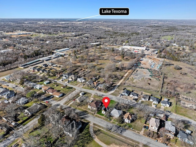 birds eye view of property with a residential view