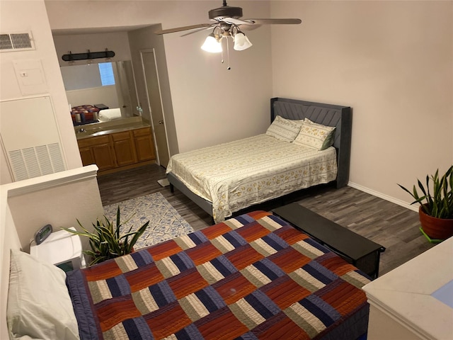 bedroom with dark wood-type flooring and ceiling fan