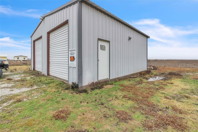 view of outdoor structure with a garage