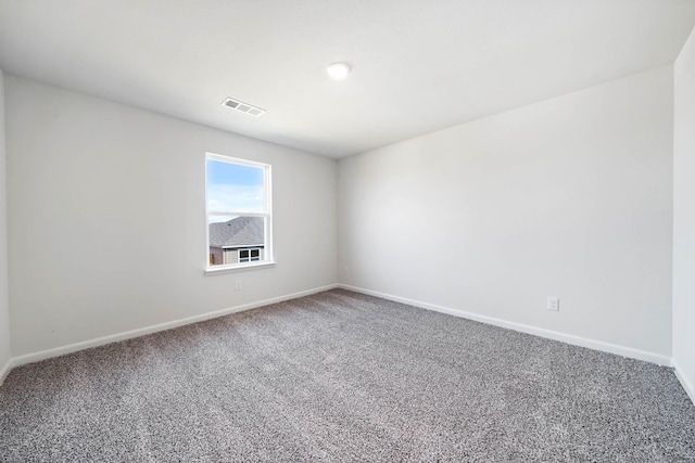 unfurnished room with carpet floors