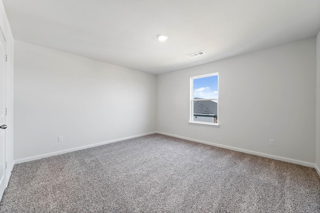 unfurnished room featuring carpet flooring