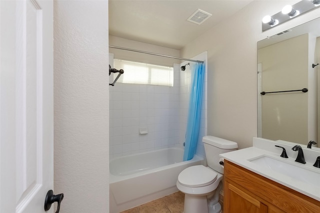 full bathroom with tile patterned flooring, vanity, shower / tub combo with curtain, and toilet