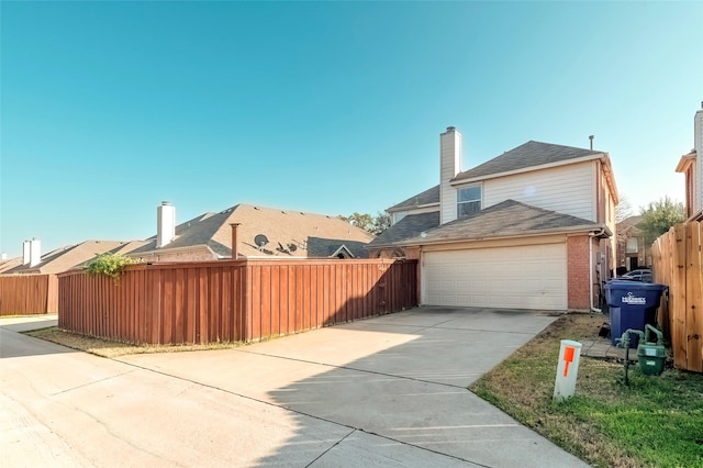 view of property exterior featuring a garage