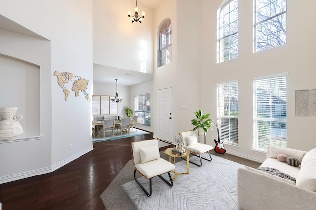 interior space with dark hardwood / wood-style flooring and a chandelier