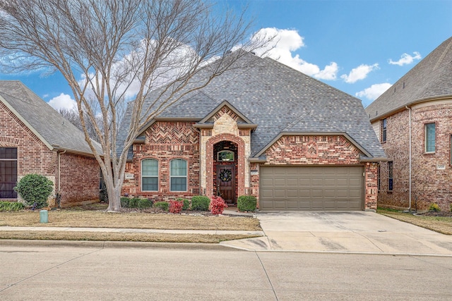 view of front of property featuring a garage