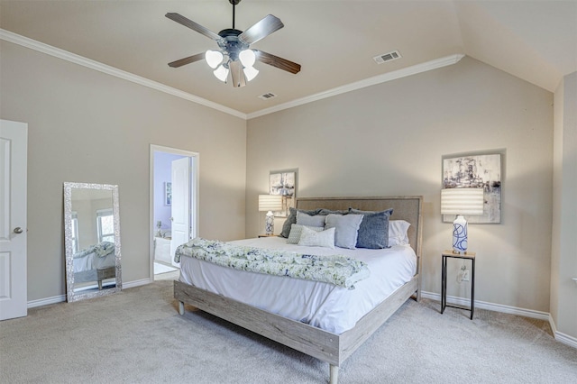 carpeted bedroom featuring ceiling fan, lofted ceiling, ornamental molding, and connected bathroom