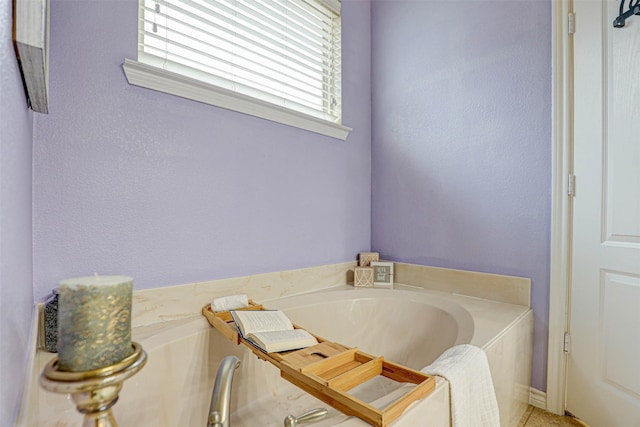 bathroom with a washtub