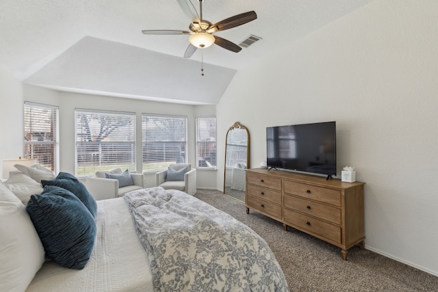 carpeted bedroom with ceiling fan and lofted ceiling