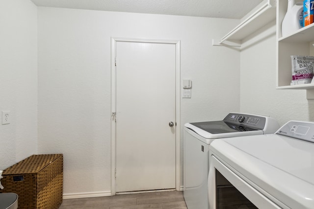 laundry room with washer and clothes dryer