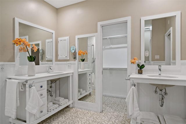 bathroom featuring tile patterned flooring and sink