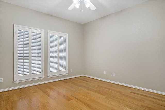 spare room featuring ceiling fan and light wood-type flooring