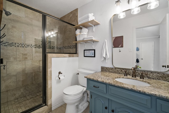 bathroom featuring vanity, tile patterned floors, toilet, and walk in shower