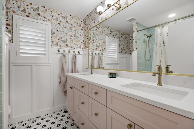 bathroom with vanity and a shower with shower curtain