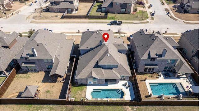 birds eye view of property featuring a residential view