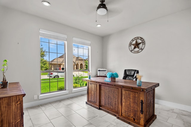 office area with ceiling fan