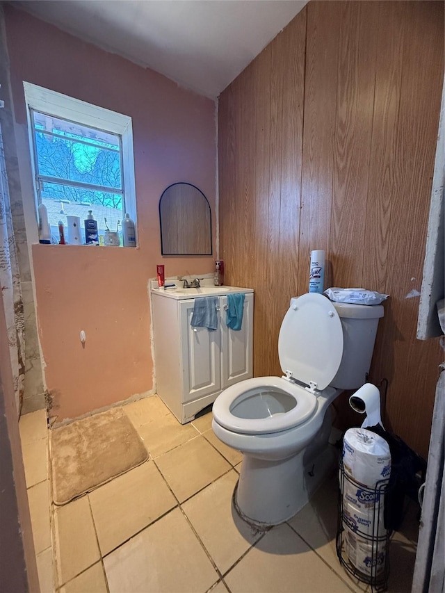 bathroom with tile patterned floors, toilet, and vanity