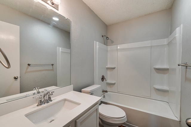 full bathroom with vanity, toilet, shower / bathtub combination, and a textured ceiling