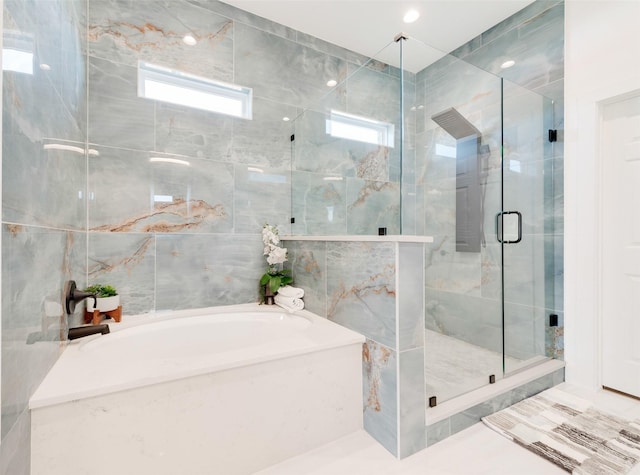 327 Lovers Ln, Terrell, TX 75160 - bathroom with a shower stall and a bath
