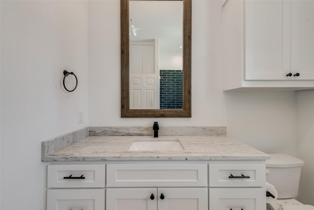 327 Lovers Ln, Terrell, TX 75160 - bathroom with vanity and toilet