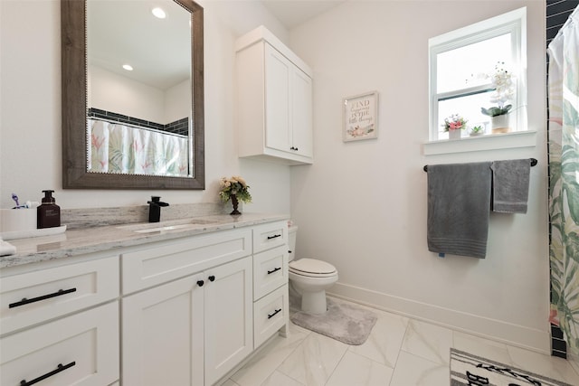 327 Lovers Ln, Terrell, TX 75160 - full bathroom with vanity, baseboards, toilet, marble finish floor, and recessed lighting