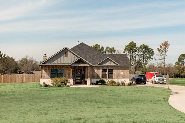 327 Lovers Ln, Terrell, TX 75160 - view of property's community featuring a garage, a lawn, and driveway