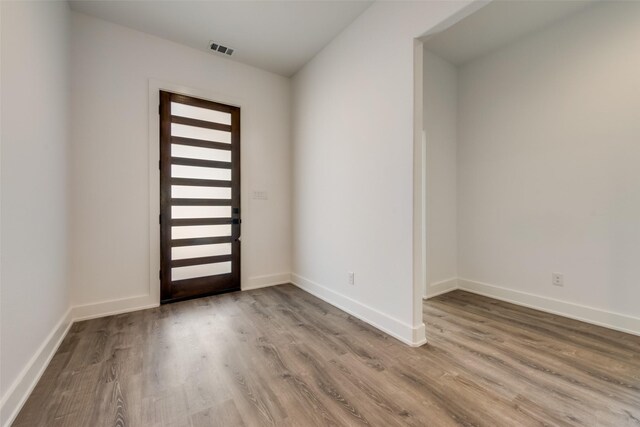 327 Lovers Ln, Terrell, TX 75160 - mudroom featuring baseboards and light wood-style flooring