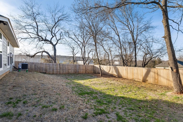 view of yard featuring central AC