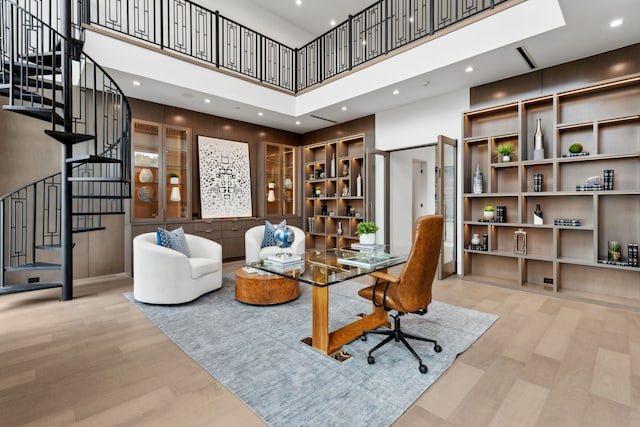 10335 Lennox Ln, Dallas, TX 75229 - office with a towering ceiling, recessed lighting, and wood finished floors