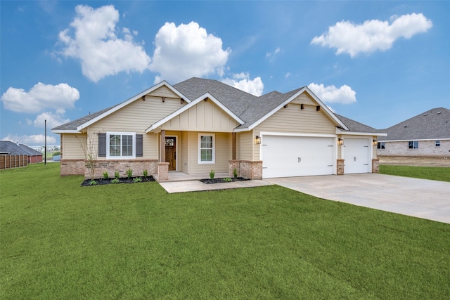 craftsman-style house featuring a garage and a front yard