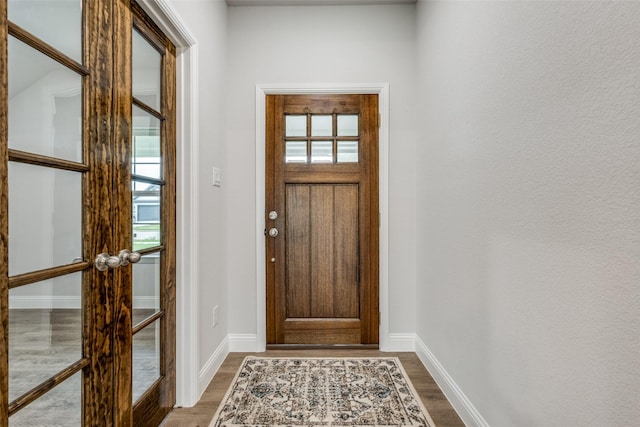 entrance foyer featuring hardwood / wood-style floors