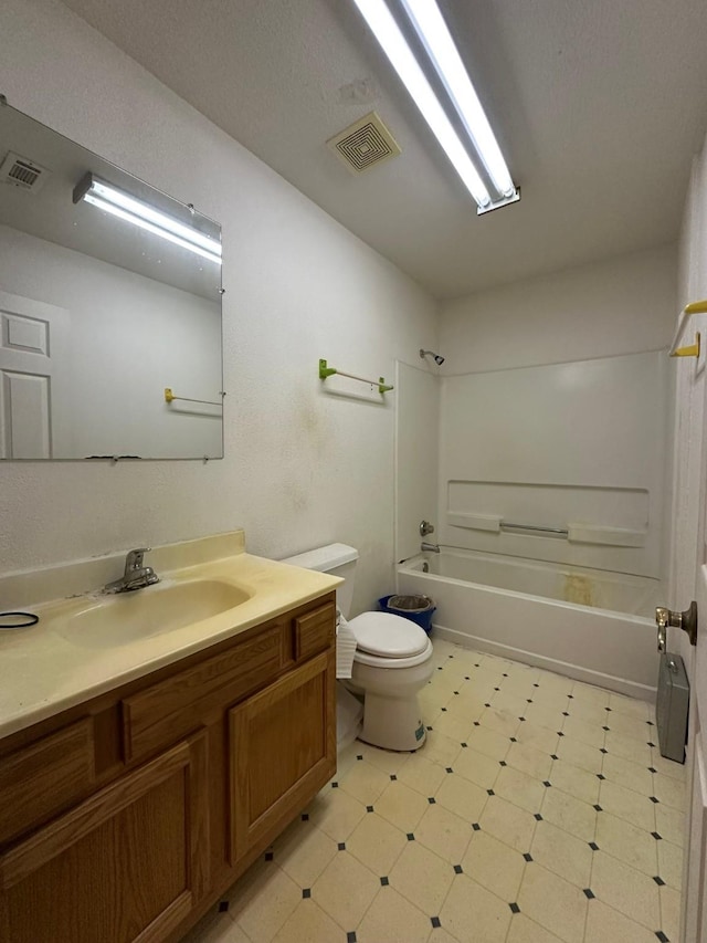 full bathroom featuring vanity, toilet, and shower / bath combination