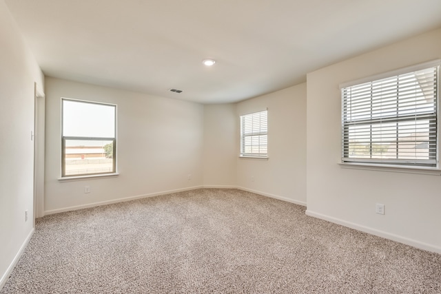 view of carpeted spare room