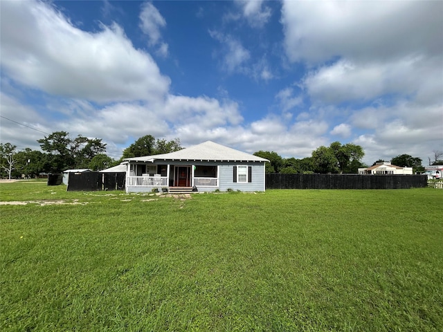 1321 Hall St, Lancaster, TX 75134 - back of house with a porch