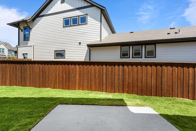 view of yard featuring a patio area and fence