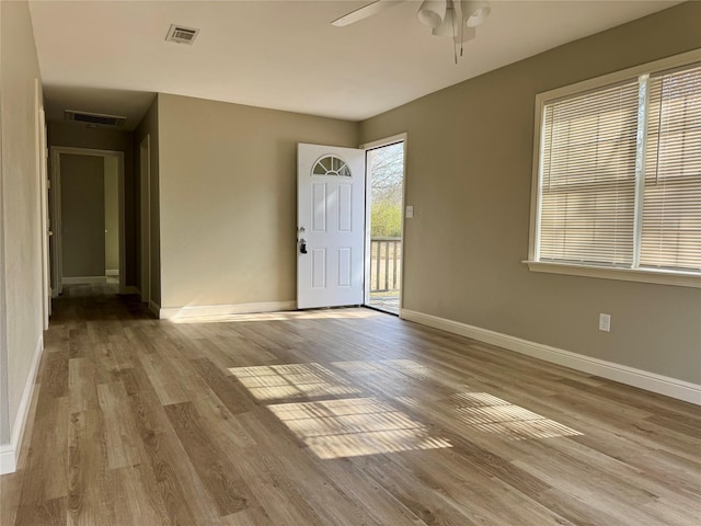 entryway featuring ceiling fan and light hardwood / wood-style floors