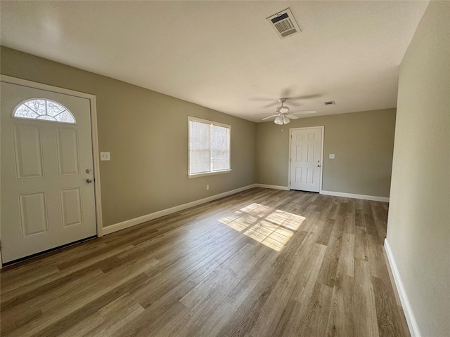 entrance foyer featuring ceiling fan and light wood-type flooring