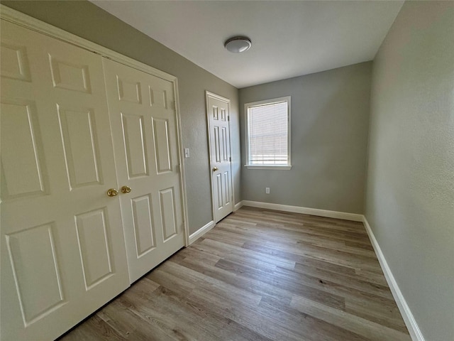 unfurnished bedroom featuring light hardwood / wood-style flooring