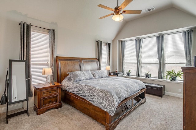 carpeted bedroom featuring lofted ceiling and ceiling fan