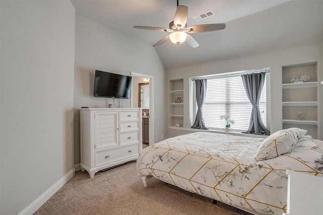 bedroom with lofted ceiling, light colored carpet, and ceiling fan