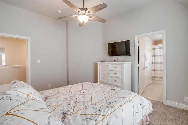 bedroom featuring ceiling fan and light carpet