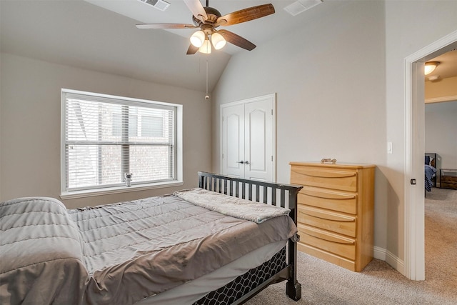 carpeted bedroom featuring vaulted ceiling and ceiling fan