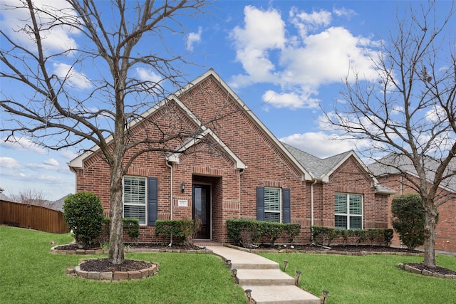 view of property featuring a front yard