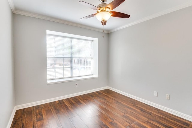 empty room featuring a ceiling fan, crown molding, dark wood finished floors, and baseboards